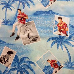 May include: Fabric with a tropical theme featuring images of Elvis Presley in various poses. The background is a light blue with palm trees and ocean waves. The images of Elvis are in color and black and white.