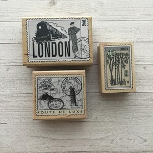 Zestaw 3 zabytkowych znaczków pocztowych Hero Arts Postage/Travel Wood Mounted Rubber Stamps/Postage Stamps/International/Pre-Owned
