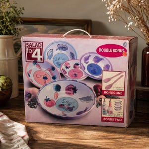 May include: A boxed salad set for four featuring oval and round plates with vegetable illustrations. The box includes bonus items: bamboo servers, oil and vinegar bottles, and dipping dishes. The plates are decorated with carrots, lettuce, tomatoes, and onions.