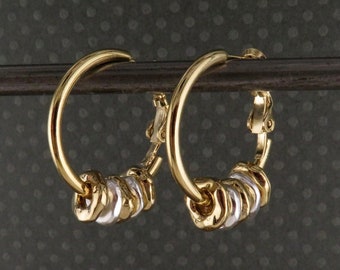 Aros de dos tonos / Aros de oro y plata / Aros de metal mixto / Aros martillados / Aros colgantes de oro y plata / Aros únicos