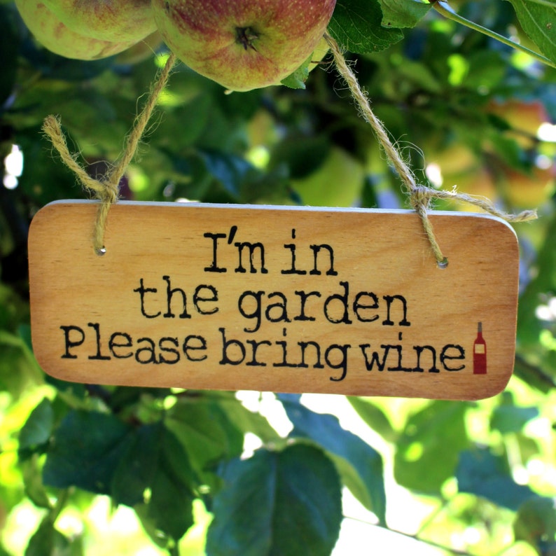 Quirky Stocking Stuffers, I'm In The Garden Please Bring Wine Rustic Wooden Sign © Wotmalike | etsy.com
