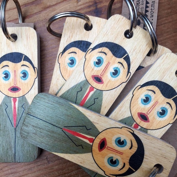 Portachiavi in legno con personaggio Frank Sidebottom