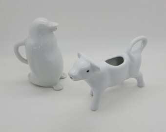 Pair of White Porcelain Animal Creamers, Penguin & Cow, Vintage