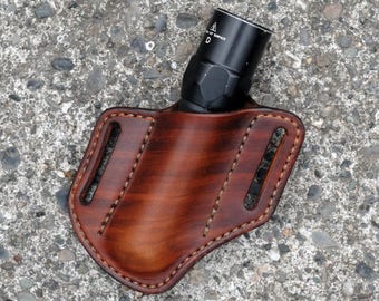 Flashlight holster for 1" diameter flashlights, canted carry L James Thieman Leathercraft Handmade Heirloom Quality Leathergoods