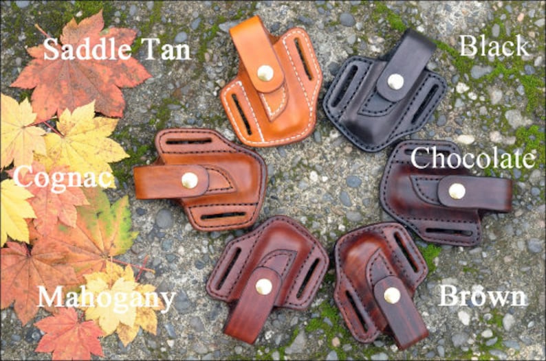 May include: Seven leather knife sheaths in different colours: Saddle Tan, Cognac, Mahogany, Brown, Chocolate, Black. Each sheath has a belt loop and a snap closure.