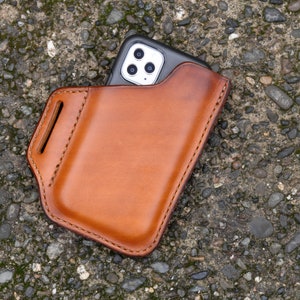 iPhone 12 Pro leather iPhone holster Custom fit for iPhone 12 6.1" screen in Otterbox Symmetry iPhone case L James Thieman Leathercraft