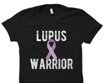 May include: Black t-shirt with the text "Lupus Warrior" in white with a purple ribbon graphic.