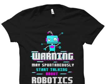 May include: Black t-shirt with a blue robot graphic and the text "WARNING MAY SPONTANEOUSLY START TALKING ABOUT ROBOTICS" in pink and white.