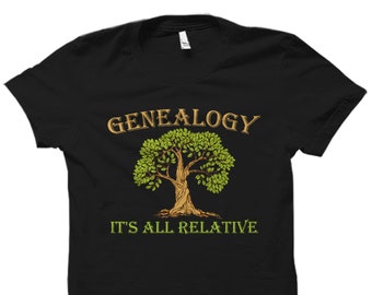 May include: Black t-shirt with a green tree and the text "Genealogy It's All Relative" in gold.