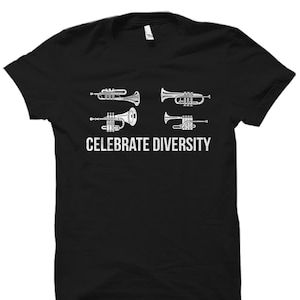 May include: Black t-shirt with a white graphic of four different trumpets and the text "Celebrate Diversity".