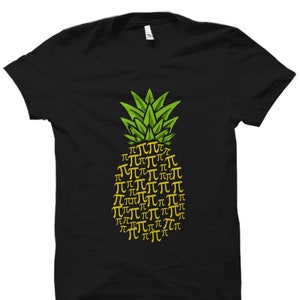 May include: Black t-shirt featuring a green pineapple design made up of yellow "pi" symbols.