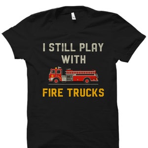 Funny Fireman Gift. Firefighter Shirt. Firefighter Gift. Fire Chief Shirt. Emergency Responder Shirt. Still Play With Fire Trucks #OS2170