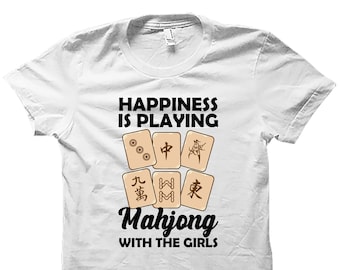 May include: White t-shirt with black text that reads "Happiness is playing Mahjong with the girls". The shirt features a graphic of Mahjong tiles.