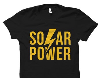 May include: Black t-shirt with a yellow lightning bolt graphic and the text "SOLAR POWER" printed on the front.