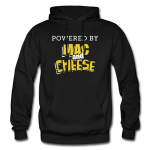 May include: Black hooded sweatshirt with the text "Powered by Mac and Cheese" in yellow.