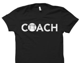 May include: Black t-shirt with white text that reads "COACH" and a white baseball graphic.