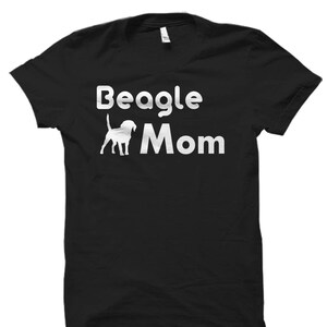 May include: Black t-shirt with white text that reads "Beagle Mom" and a silhouette of a beagle dog.