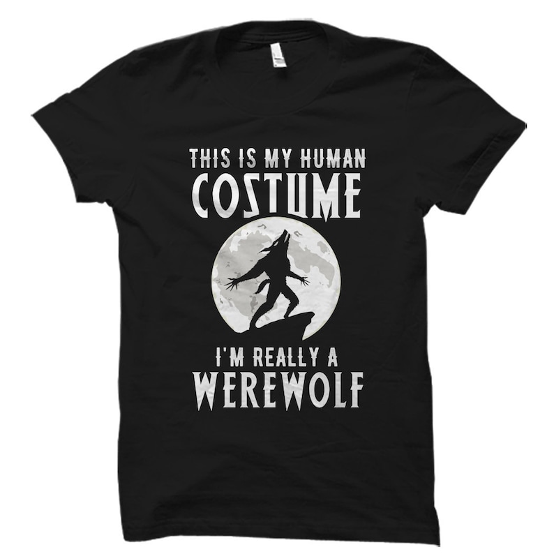 May include: Black t-shirt with a werewolf silhouette howling at the moon. The text reads "This is my human costume I'm really a werewolf."