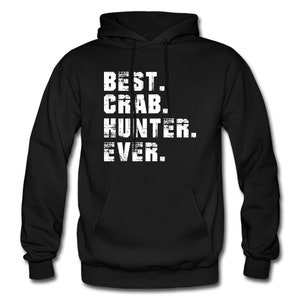 May include: Black hooded sweatshirt with the text "BEST. CRAB. HUNTER. EVER." in white distressed lettering.