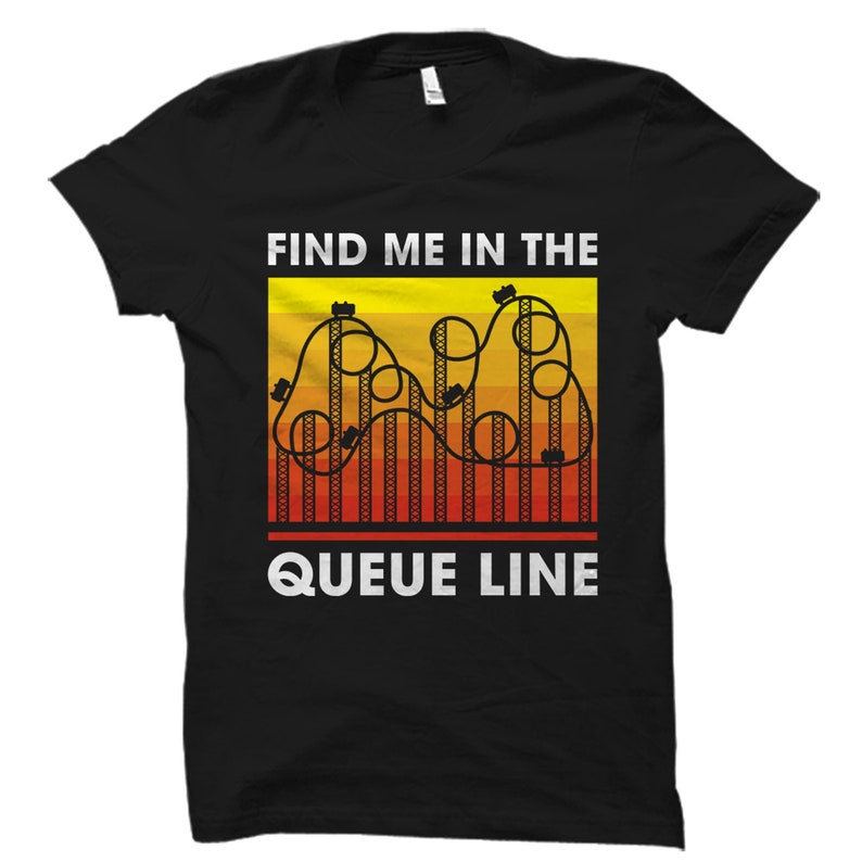 May include: Black t-shirt with a graphic of a roller coaster and the text "Find me in the queue line".