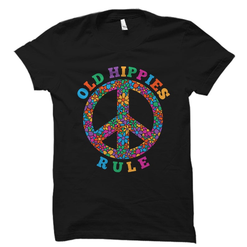 May include: Black t-shirt with a peace sign made of colorful flowers and the text "OLD HIPPIES RULE" in rainbow colors.