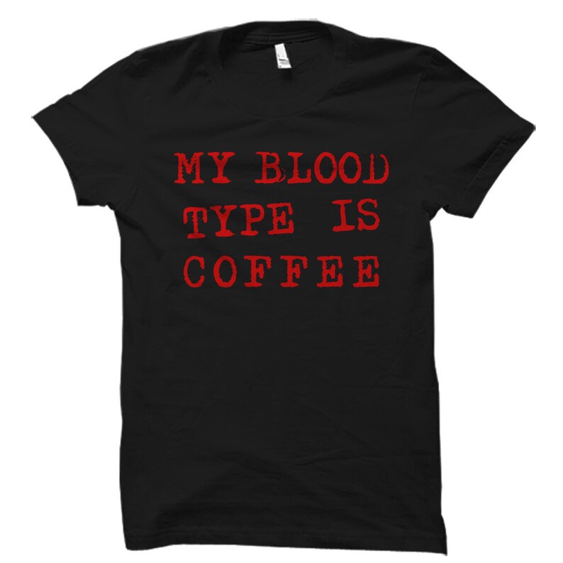 May include: Black t-shirt with the text "My blood type is coffee" in red.