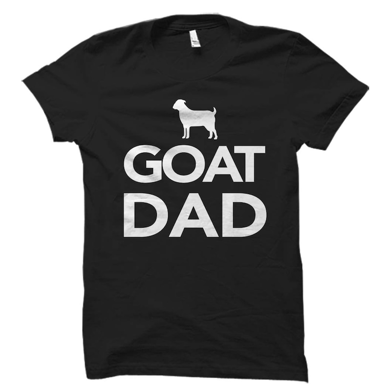 May include: Black t-shirt with a white silhouette of a goat and the text "GOAT DAD" printed on the front.