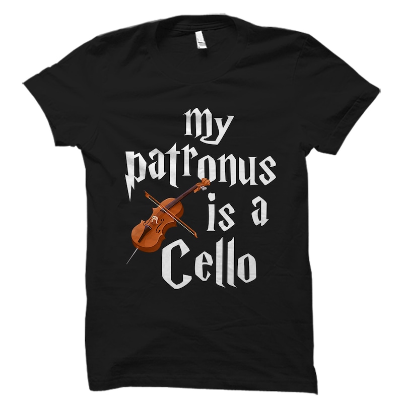 May include: Black t-shirt with white text that reads "My Patronus is a Cello" and a graphic of a cello.