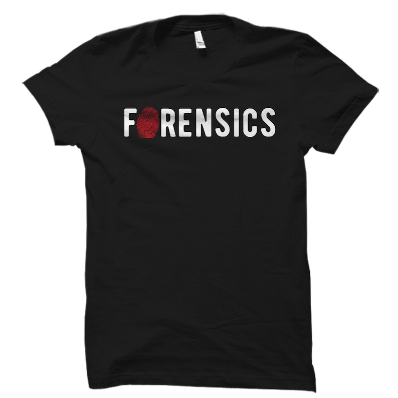 May include: Black t-shirt with the word "FORENSICS" in white text and a red fingerprint graphic.