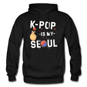 May include: Black hoodie with white text that reads "K-POP IS MY SEOUL" with a heart and hand gesture graphic and a South Korean flag graphic.