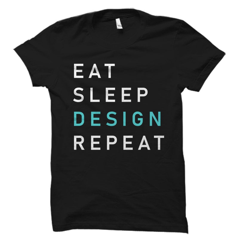 May include: Black t-shirt with white text that reads "Eat Sleep Design Repeat". The word "Design" is in teal.