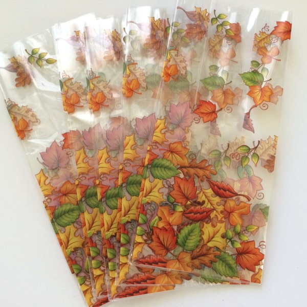 Bags, cello clear with Fall leaves, orange brown & green, 3 1/2 x 7 1/2 inches, 25 count, packaging, jewelry wrapping, snacks and crafting