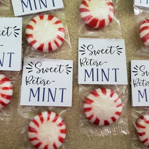 May include: A set of six small clear plastic bags, each containing a red and white peppermint candy and a white card with the text "Sweet Retire-MINT" in black and blue lettering.