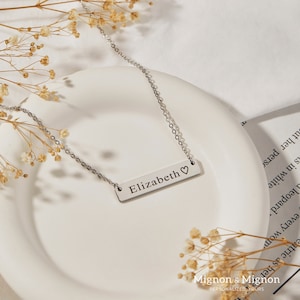 Customizable bar necklace for women, ideal for personalizing with names, coordinates, or messages. Perfect as personalized jewelry, name necklace, or coordinates necklace. Great as a gift for birthdays, Christmas, or a mother necklace in gold.