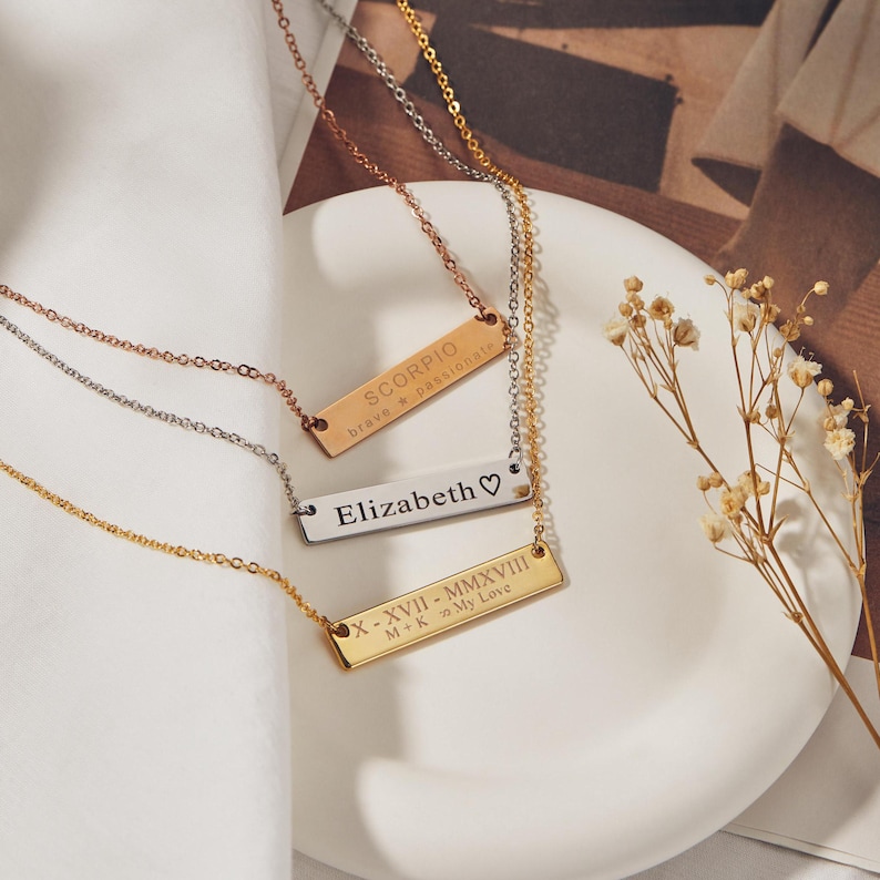 Customizable bar necklace for women, ideal for personalizing with names, coordinates, or messages. Perfect as personalized jewelry, name necklace, or coordinates necklace. Great as a gift for birthdays, Christmas, or a mother necklace in gold.
