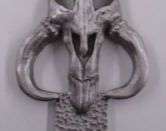 topper de matrícula de cráneo de mitosaurio mandaloriano