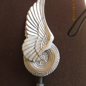 vintage flying tire, very rare, motorcycle, ratrod,hotrod, car hood ornament
