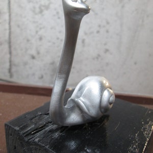 rare royal British snail car hood ornament