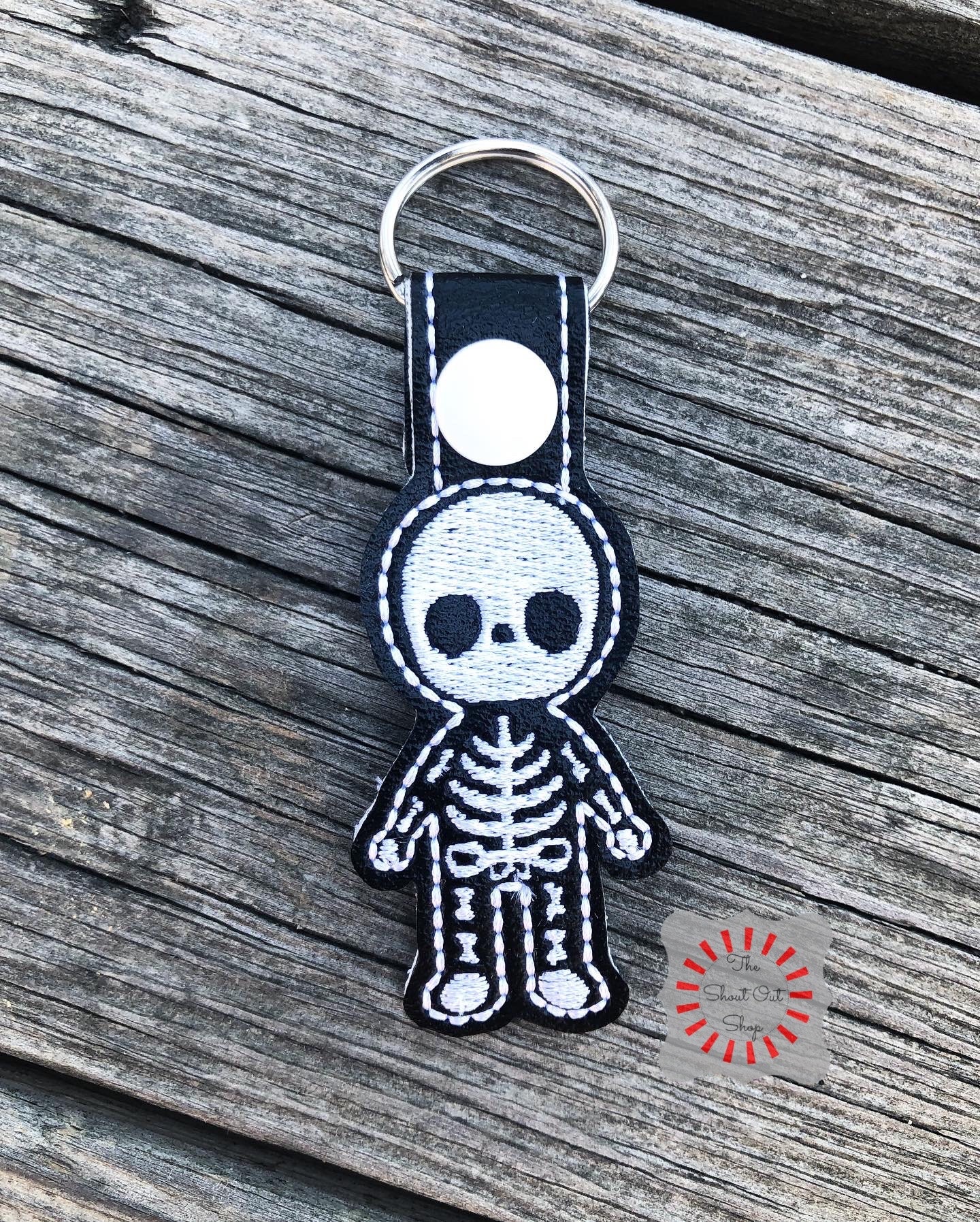 Plastic shop skeleton keychain