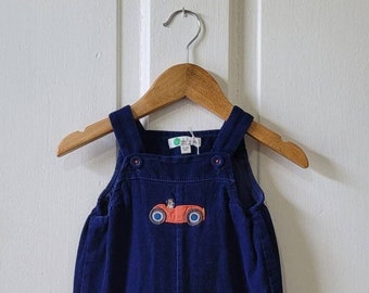 BODEN Baby Blue Corduroy Overalls with Car and Dog Motif - 6/12 months