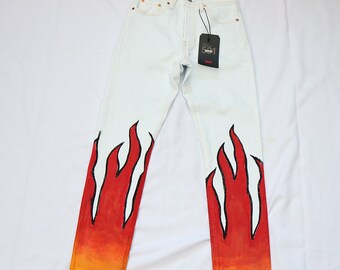fire painting on jeans