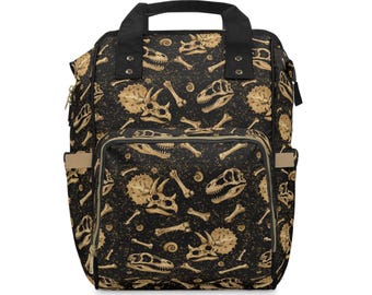 Mochila de pañales con estampado de fósiles de dinosaurio