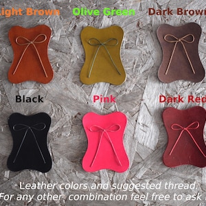 May include: A selection of leather samples in various colors, including light brown, olive green, dark brown, black, pink, and dark red. Each sample has a bow-like design with matching thread. Text reads "Leather colors and suggested thread."