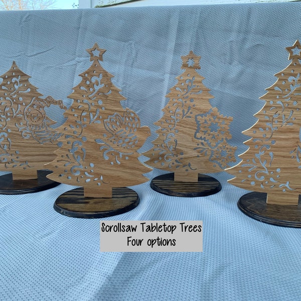 Tabletop Christmas Tree. Avalable in four designs ( Nativity, Snowflake, Snowman, and Partridge) to compliment your holiday decorations.