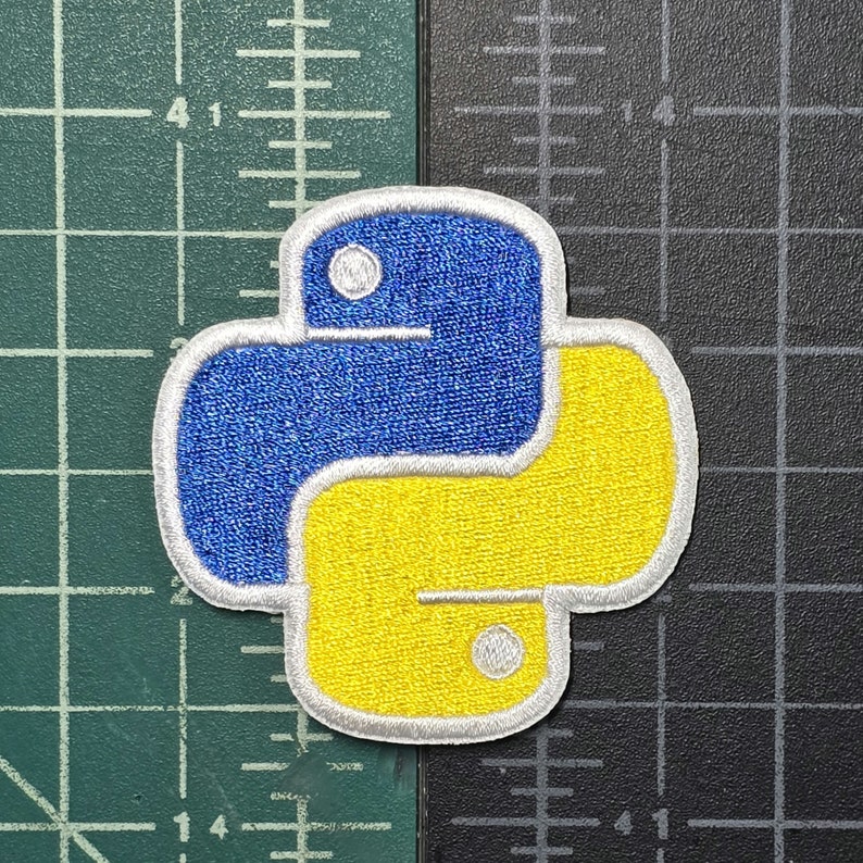 May include: A yellow and blue embroidered Python logo patch. The patch is white outlined and has a textured fabric.