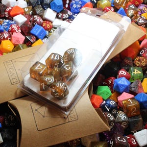 Perfect Plastic™ Celestial Polyhedral Dice Set - Cosmic Amber - Polished