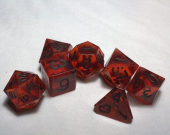 Demonic Glow - Perfect Plastic™ Standard Polyhedral Dice Set - Raw - Hand Waxed - Black