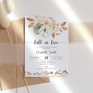 May include: A bridal shower invitation with a watercolour illustration of white pumpkins, autumn leaves, and flowers. The text reads "fall in love" and includes the bride's name, date, time, and location. RSVP information is also included.