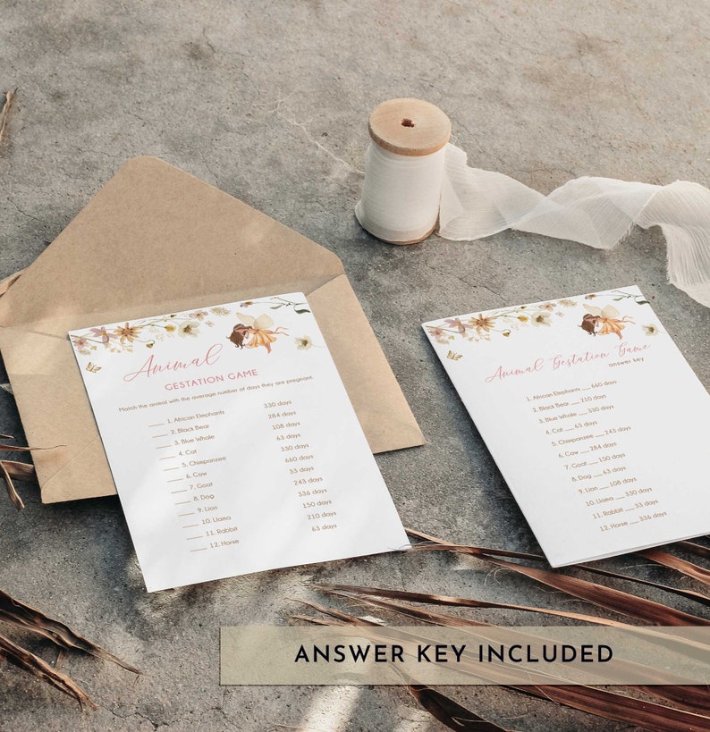 May include: A printable game card with a floral design and the title "Animal Gestation Game". The card lists 12 animals and their gestation periods in days. The text "Answer Key Included" is printed at the bottom of the card.