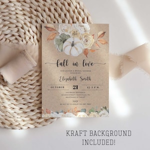 May include: Fall in love bridal shower invitation with a kraft paper background. The invitation features a watercolour illustration of white pumpkins, autumn leaves, and white and cream roses. The text on the invitation reads "Fall in love" and includes the date, time, and location of the shower.